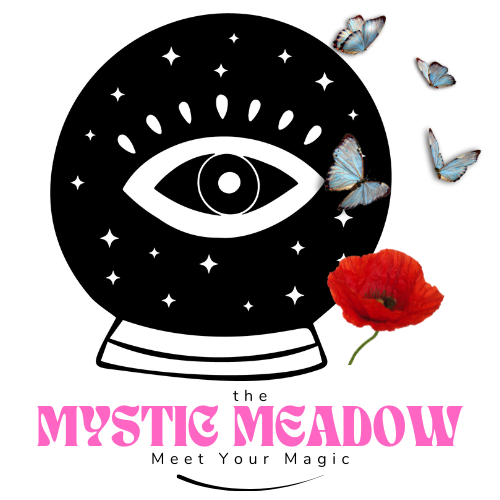 The Mystic Meadow Logo: A Crystal ball with an illustrated eye at the center.